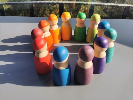 Hölzerner Regenbogen-Stapler-hölzernes Memorystick-Spiel Art Pegdoll