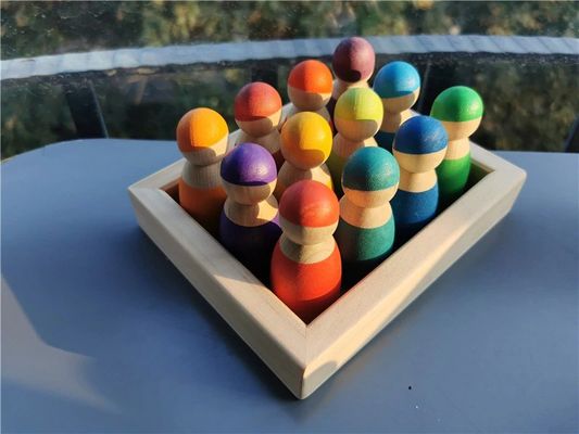 Hölzerner Regenbogen-Stapler-hölzernes Memorystick-Spiel Art Pegdoll