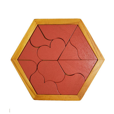 Sechseckige hölzerne Puzzlen des Montessori der Kinder