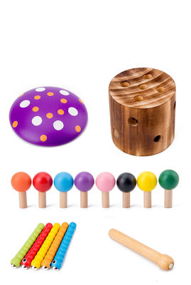 Hölzerner Fang das Wurm-Spiel für Augen-Koordinations-Training der Kinder Hand