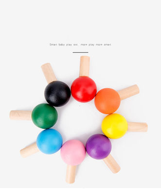 Hölzerner Fang das Wurm-Spiel für Augen-Koordinations-Training der Kinder Hand