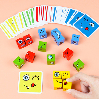 Neues Montessori-Ausdruck-Puzzlespiel-Gesichts-Änderungs-WürfelBaustein Spielwaren-frühes lernendes pädagogisches Match-Spielzeug für Kinder