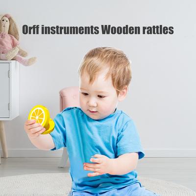 Hölzerne musikalische Spielwaren für das Kinderbaby, das Montessori pädagogisch greift